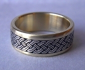 Double Lined Yellow and White Gold Celtic Eternity Braid Ring